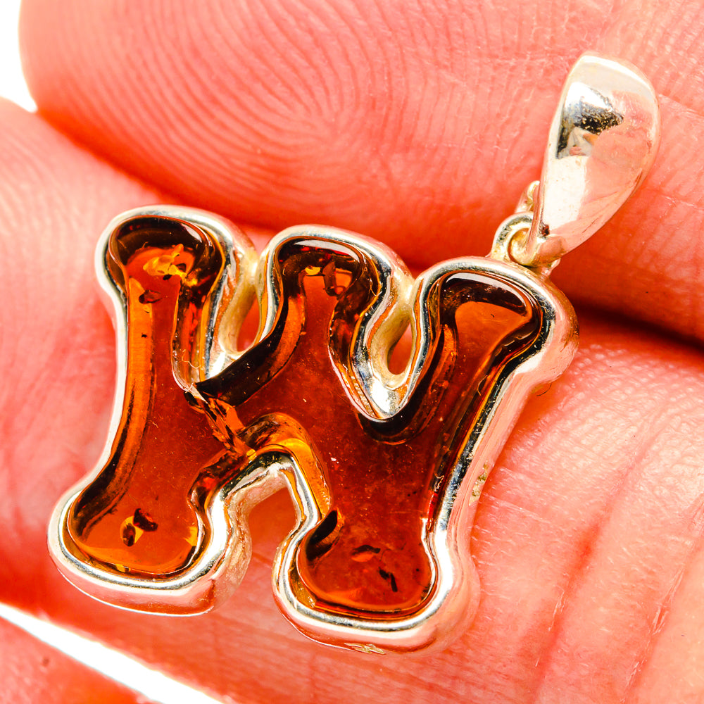 Letter W charm golden metal