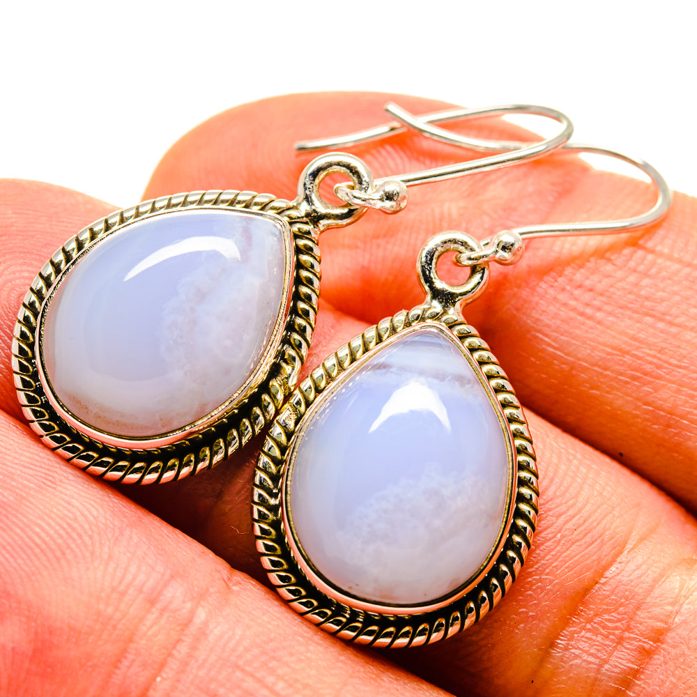 silver earrings with blue topaz